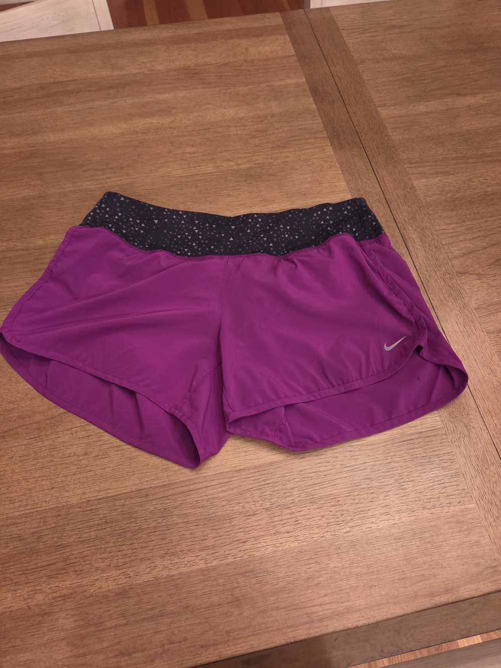 Nike Women’s Magenta Athletic Shorts with Black Patterned Waistband
